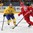 MINSK, BELARUS - MAY 22: Sweden's Johan Fransson #10 skates with the puck while Dmitri Korobov #89 of Belarus defends during quarterfinal round action at the 2014 IIHF Ice Hockey World Championship. (Photo by Andre Ringuette/HHOF-IIHF Images)